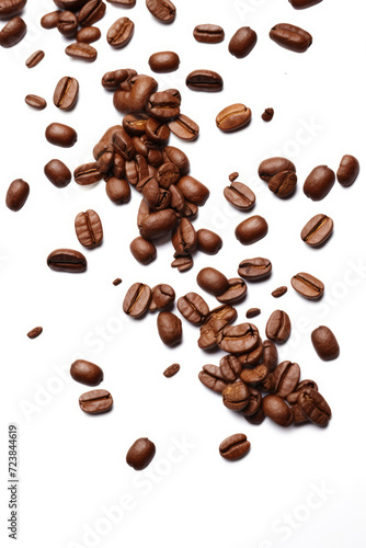 Scattered coffee beans isolated on white background