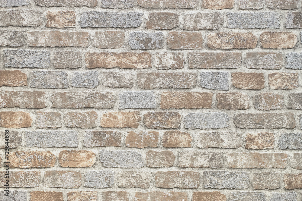 pattern of decorative stone wall background. Close-up modern beige stone tile texture brick wall pattern of decorative stone wall background. Close-up modern beige stone tile texture brick wall