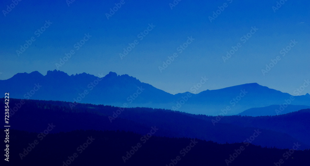 Mountain silhouette in South Tyrol, Italy, Alps, Europe, mountain ridge at dusk as silhouette, mystical and beautiful	 - obrazy, fototapety, plakaty 