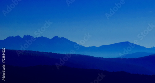 Mountain silhouette in South Tyrol, Italy, Alps, Europe, mountain ridge at dusk as silhouette, mystical and beautiful  © Zeitgugga6897