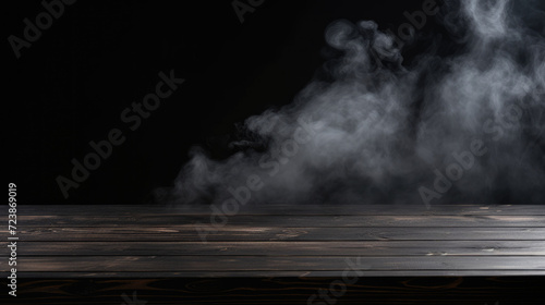 Wooden empty product area on black foggy background