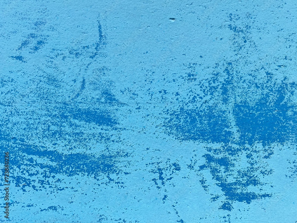 blue paint on grunge metal texture