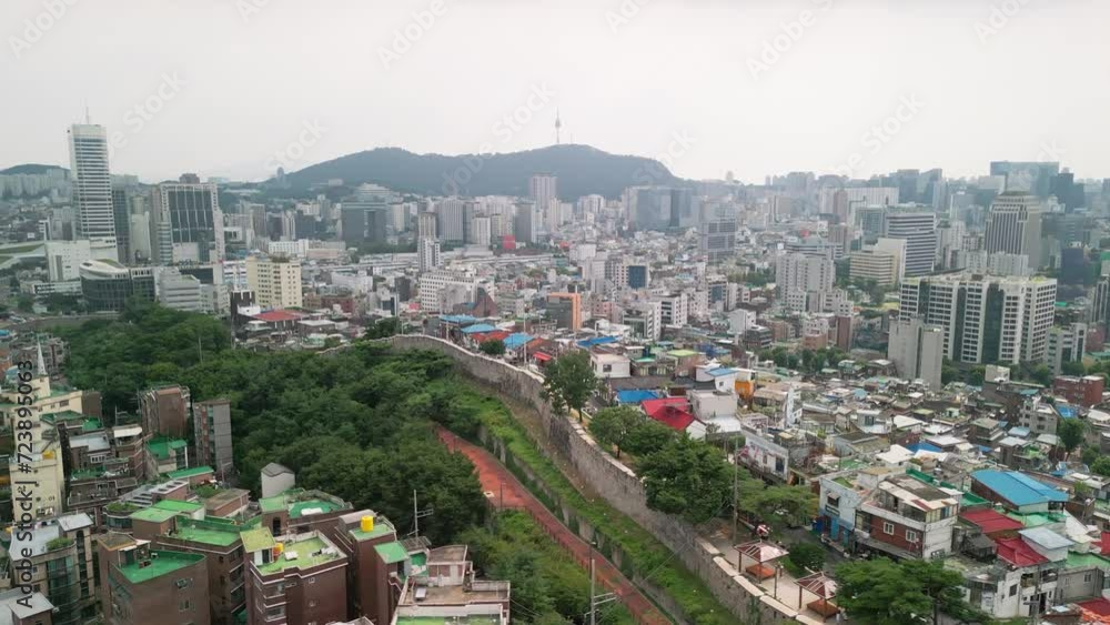 2x Speed_Flying above Seoul City Wall and village nearby. This is popular tourist attraction point. 2x Speed_Flying above Seoul City Wall and village nearby. This is popular tourist attraction point.