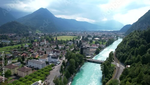 Aerial view of Grindelwald mountain village, river, town, Bernese Oberland, Switzerland.  Black Lütschine, Bernese Alps, Swiss Alps, Bern. 4k full hd drone video shooting