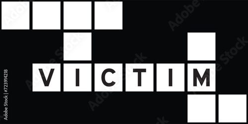 Alphabet letter in word victim on crossword puzzle background