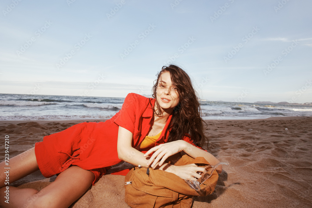 Joyful Traveler: A Woman Backpacker Experiencing the Relaxing Adventure of a Beach Vacation