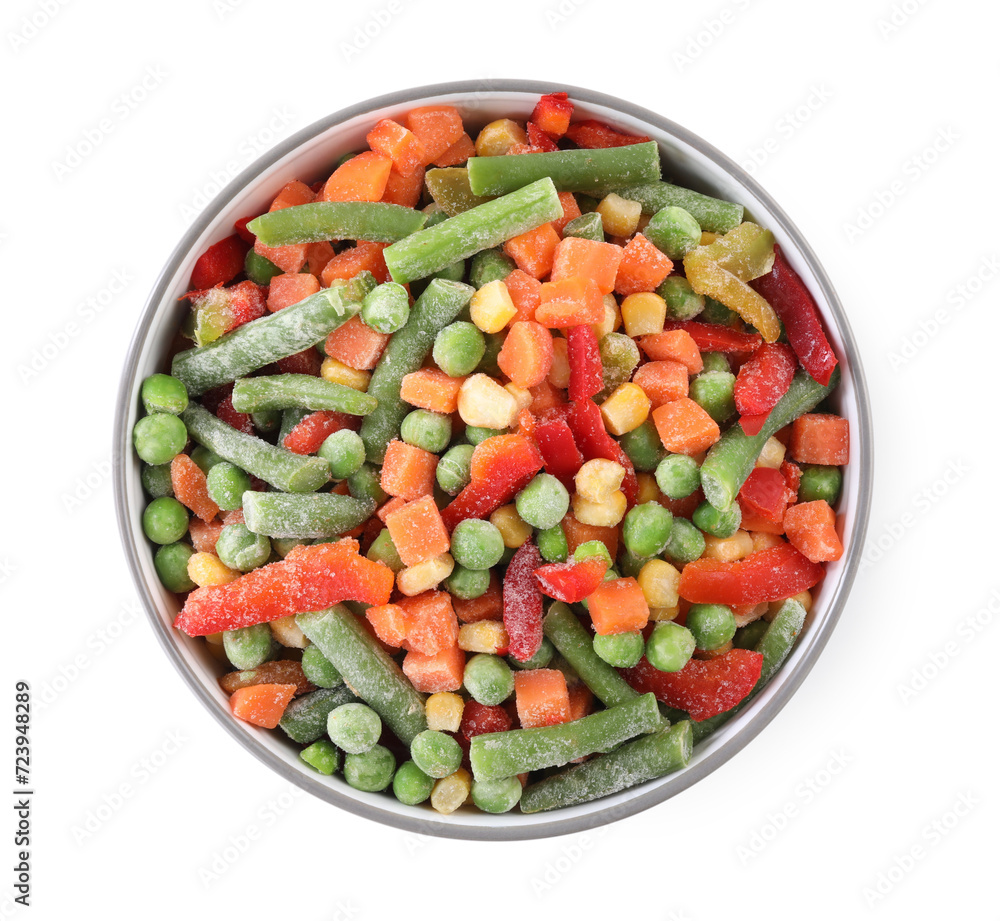 Mix of different frozen vegetables in bowl isolated on white, top view Mix of different frozen vegetables in bowl isolated on white, top view