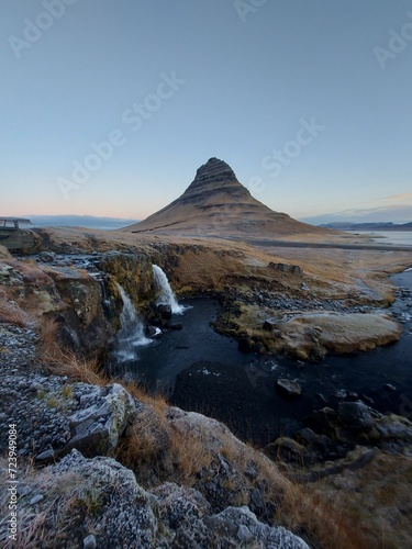 View of Kirkjufell with the waterfall in the foreground. Iceland