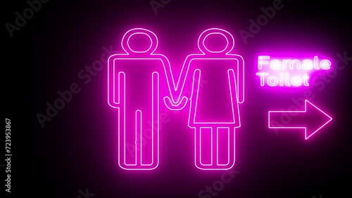 Purple neon outline female toilet or restroom sign on a black background. Female sign. Sign women's toilet. Man and women toilet signs in neon lights animation photo