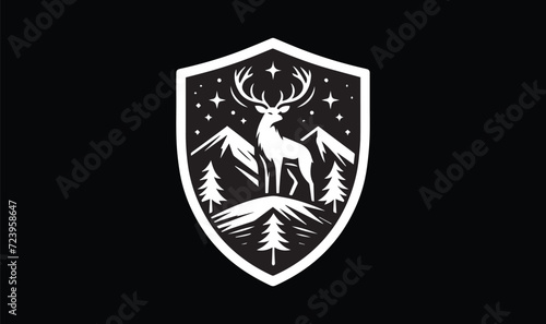 shield with wings  deer in mountain  trees stars