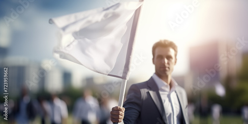Business man waving white flag , truce concept photo