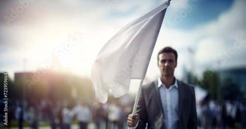 Business man waving white flag , truce concept photo