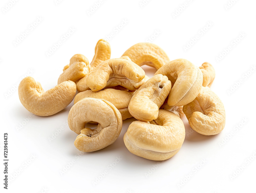 Cashews isolated on white background in minimalist style. Studio photography. Cashews isolated on white background in minimalist style. Studio photography.