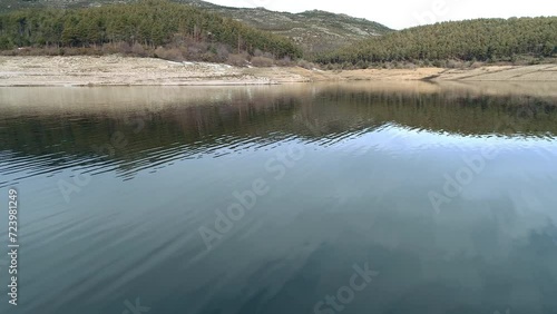aerial view in low flight over a lake