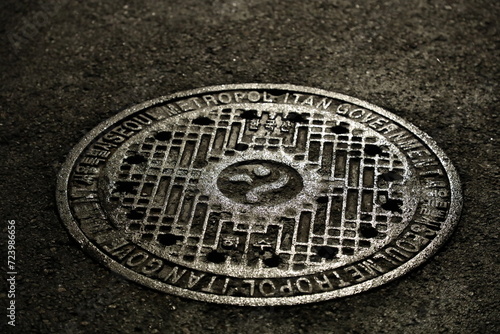 Photography manhole cover in Seoul, Korea at night