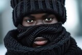 Black fashionable man model in stylish winter balaclava hat
