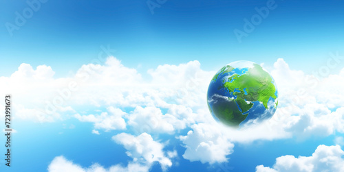 The earth soaring in a clear blue sky with white clouds  depicting clean air and the environment  a green planet  dynamic and dramatic compositions with space to copy