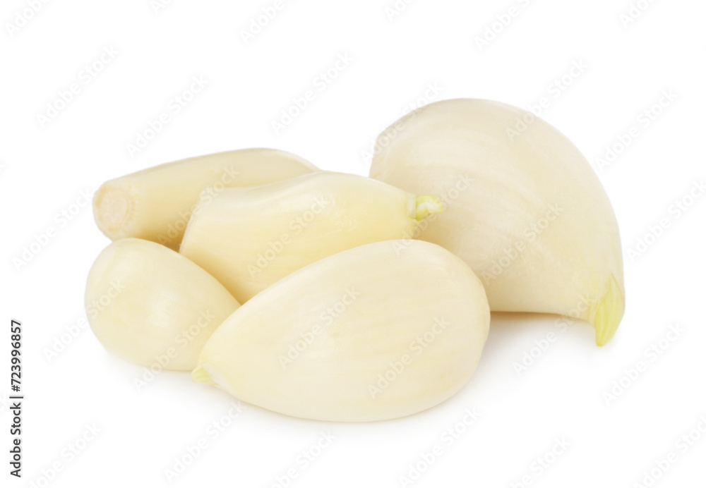Peeled cloves of fresh garlic isolated on white Peeled cloves of fresh garlic isolated on white