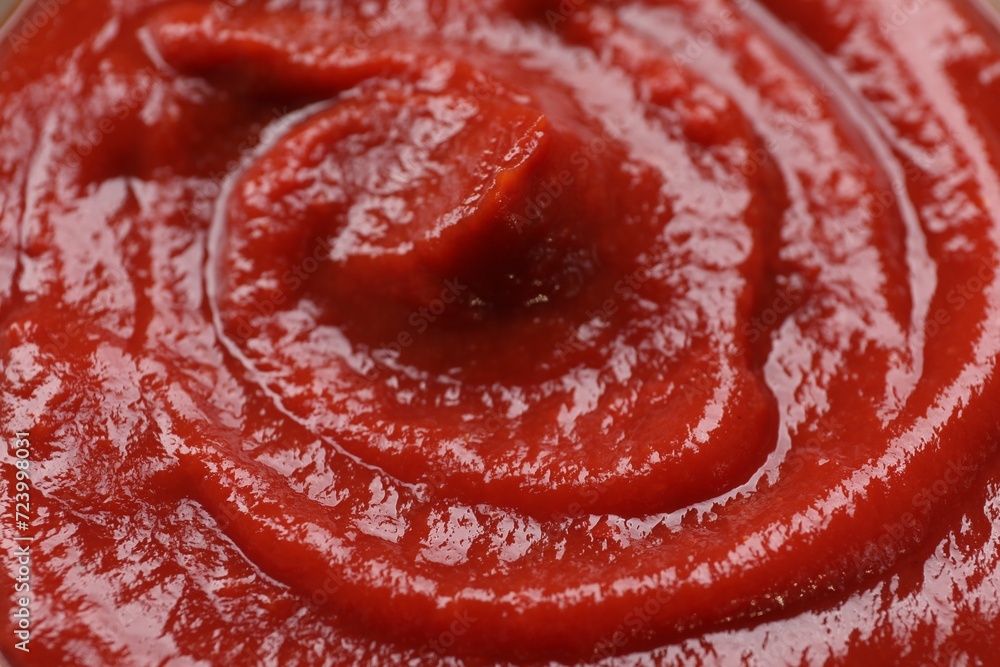 Organic ketchup as background, closeup. Tomato sauce Organic ketchup as background, closeup. Tomato sauce