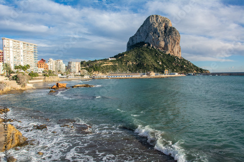 The Calpe Penyal d'Ifac massive limestone outcrop emerging from the Mediterranean sea in the comarca of Marina Alta, in the province of Alicante, Valencian Community, Spain photo