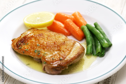 sauteed chicken with lemon butter sauce. close up
