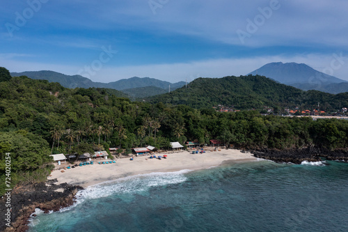 Landscape of the white sand beach of Bias Tugel situated near Padangbai harbour in Bali Indonesia with the volcano Agung nearby.