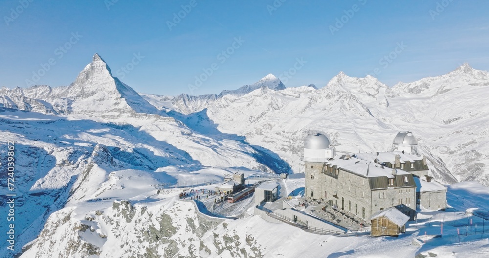 Panoramic view at Gornergrat with Matterhorn view during winter in Switzerland. Majestic mountain peaks iconic famous zermatt travel ski resort in the alps. Wonderful inspiring nature landscape.