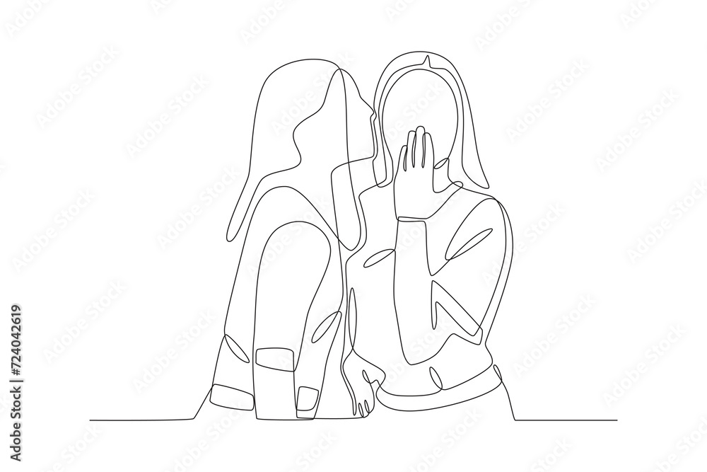 A woman tells something to her friend A woman tells something to her friend