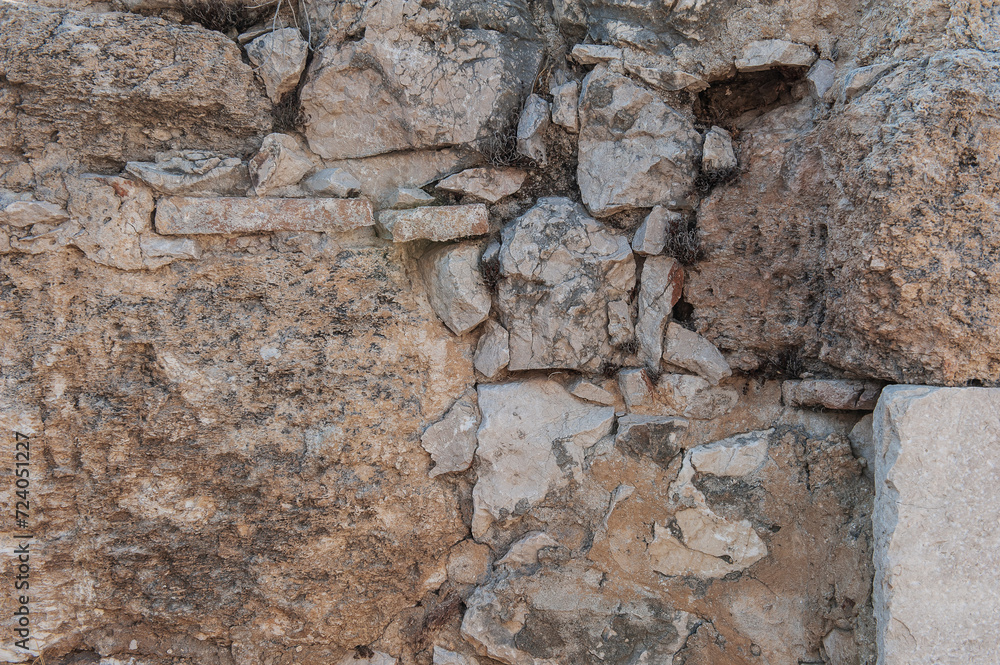 Fototapeta premium Ancient wall background with old concrete bricks