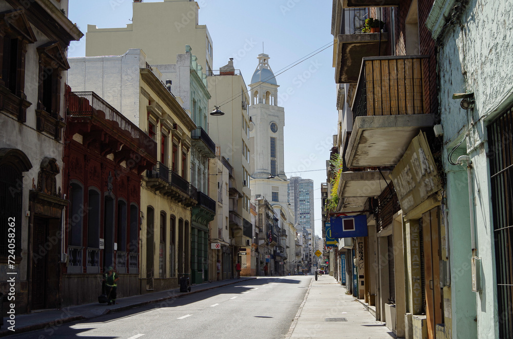 Urban street view with historic house building facades cityscape in downtown Montevideo, Uruguay shabby South American Latin architecture style exterior building skyline