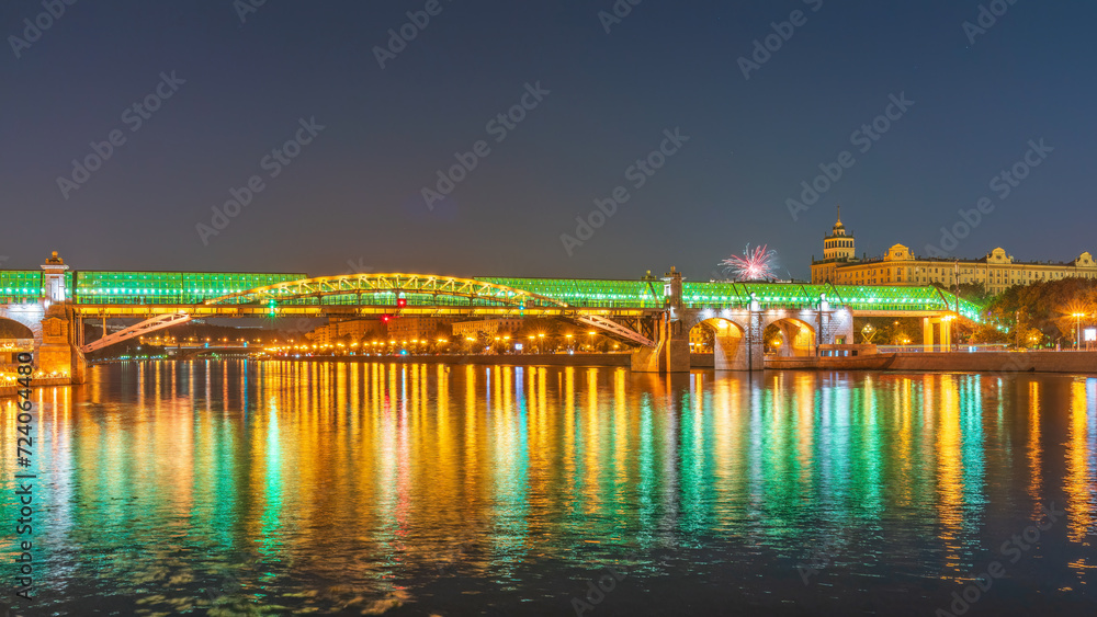 Pushkinskiy bridge with night illumination. Bridge to Gorky Park.