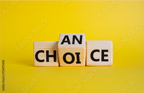 Chance and Choice symbol. Wooden cubes with words Choice and Chance. Beautiful yellow background. Chance and Choice and business concept. Copy space