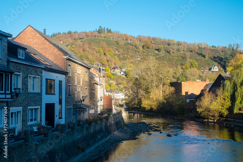 View of houses along the river Ourthe in La Roche-en-Ardenne, Belgium photo