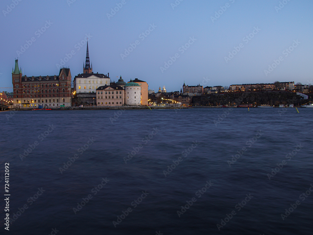 Fototapeta premium A river with a city in the background