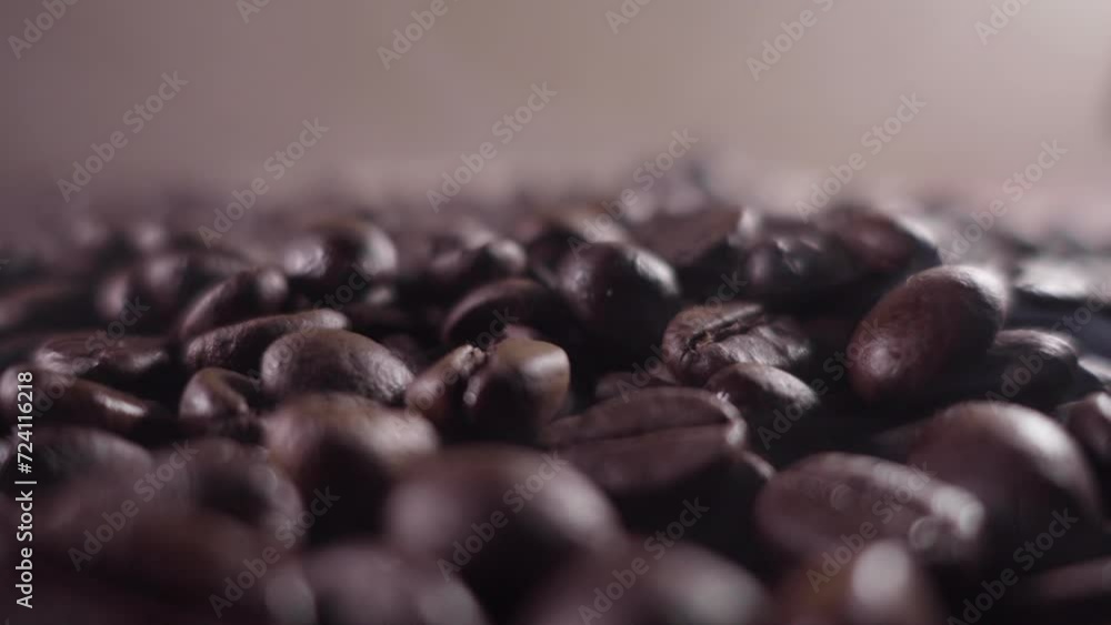 Macro shot of hot and smoky coffee beans Macro shot of hot and smoky coffee beans