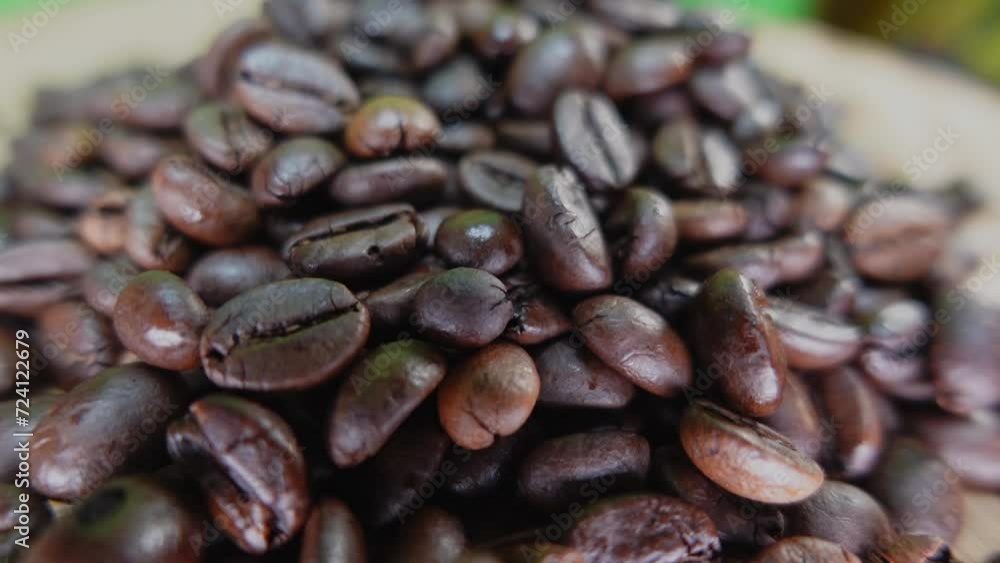 Close up slow motion cinematic beautiful shot of brown roaster coffee beans Close up slow motion cinematic beautiful shot of brown roaster coffee beans