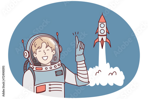 Man in astronaut clothes points finger up standing near spaceship taking off. Guy in spacesuit is member of space expedition to study decolonization of planets in galaxy. Flat vector design