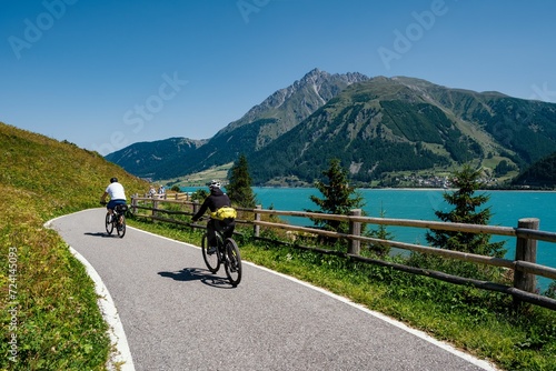 View of Lake Resia with its cycle pedestrian path in South Tyrol