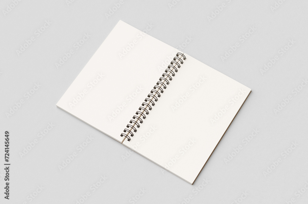 Blank white inside of a kraft spiral notebook mockup. Blank white inside of a kraft spiral notebook mockup.