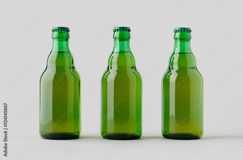 Green steinie beer bottle mockup on a grey background. Green steinie beer bottle mockup on a grey background.