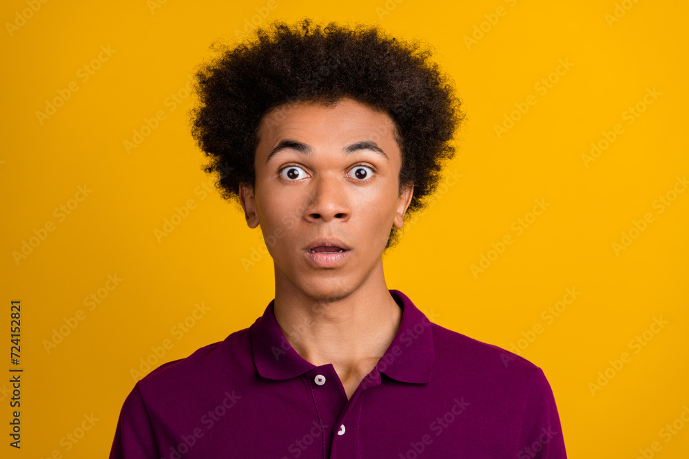 Photo of worried nervous staring speechless man wear burgundy stylish clothes confusion reaction isolated on yellow color background Photo of worried nervous staring speechless man wear burgundy stylish clothes confusion reaction isolated on yellow color background