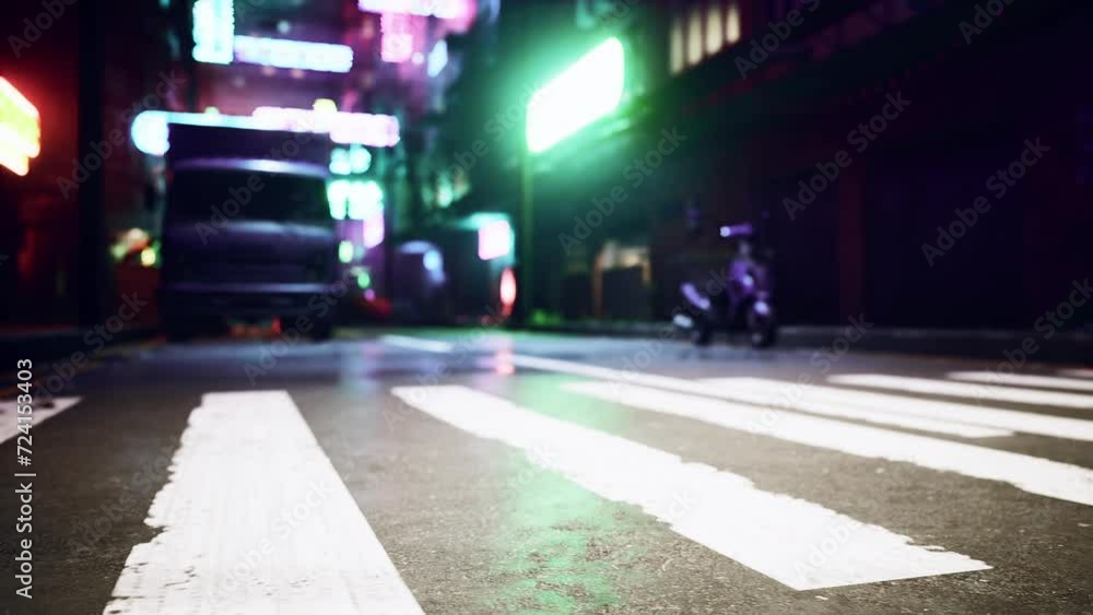 A vibrant city street illuminated by the lights of the night A vibrant city street illuminated by the lights of the night
