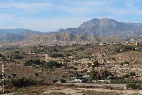 Busot, Alicante, Spain, January 28, 2024: View of Penya Mitjorn mountain from Busot, Alicante, Spain photo
