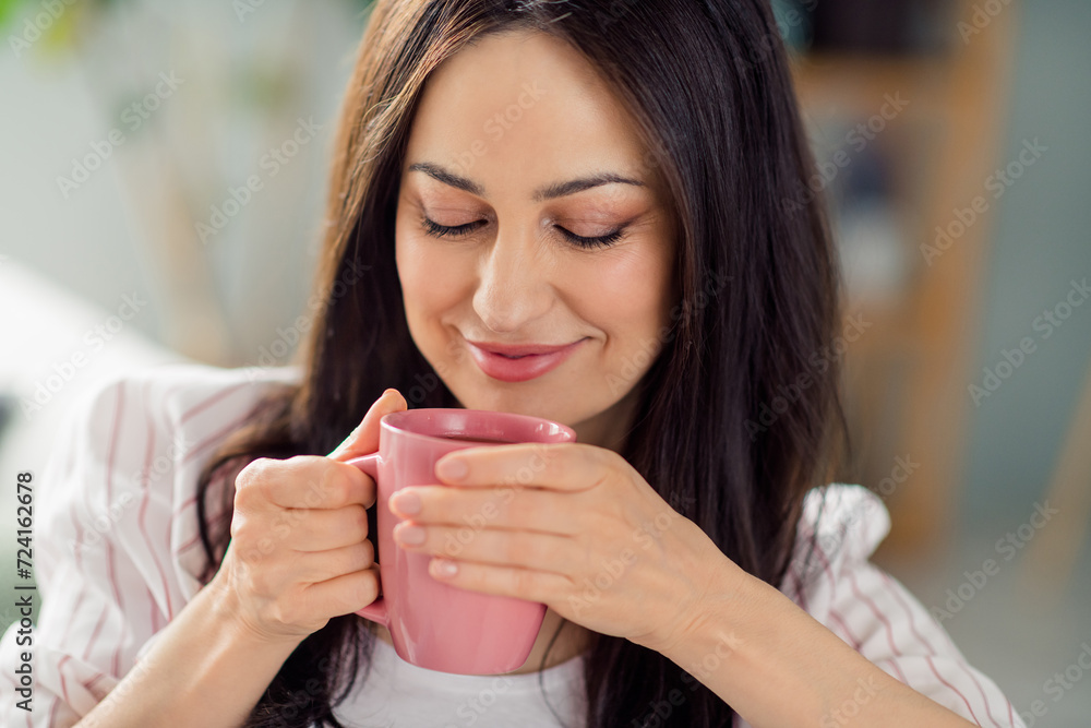 Close up cropped portrait of lovely positive lady hands hold smell fresh coffee mug free time calmness house inside Close up cropped portrait of lovely positive lady hands hold smell fresh coffee mug free time calmness house inside