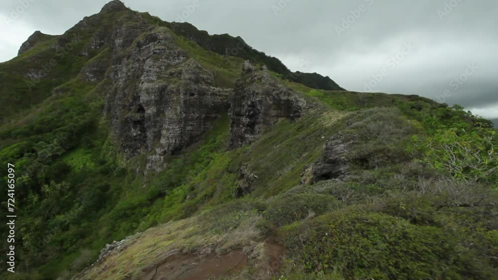 POV on top of tall Hawaiian mountain peak - wide shot POV on top of tall Hawaiian mountain peak - wide shot