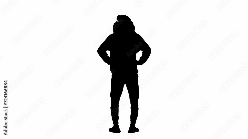 Black silhouette of a male traveler with a large hiking backpack on his back. The man is standing, looking around and pointing his index finger to the side. Hiker on white background. Rear view. Black silhouette of a male traveler with a large hiking backpack on his back. The man is standing, looking around and pointing his index finger to the side. Hiker on white background. Rear view.