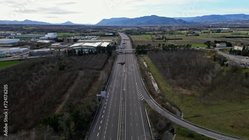 Loriol sur Drome, France - January 27, 2024: Empty A7 Sunny Motorway in France. Farmers' Protest, Tires, Tractors, Agricultural Machines on the Highway, completely blocking road traffic. photo