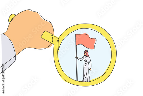 Continuous one line drawing big hand holding the magnifier by highlighting Arabian businessman who is standing holding the flag. A symbol of the glory of a businessman. Single line draw design vector