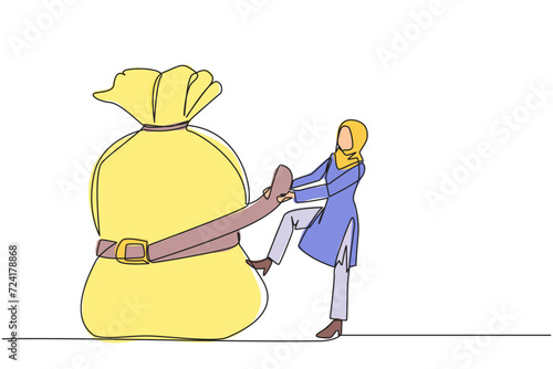 Single continuous line drawing Arab businesswoman wrapped around and pulled the money bag with a belt. Investment decrease, sale drop. Save on unnecessary expenses. One line design vector illustration