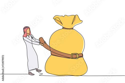 Single one line drawing Arab businessman wrapped around and pulled the money bag with a belt. Investment decrease, sale drop. Save on unnecessary expenses. Continuous line design graphic illustration